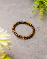 Tiger's Eye Slim Bracelet with Ganesha Charm