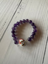 Amethyst Bracelet with a Silver Sai Baba Charm